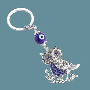Silver and blue Owl keychain with evil eye
